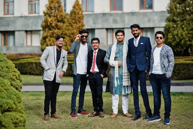a group of young doctors are standing in front of medical university in kyrgyzstan