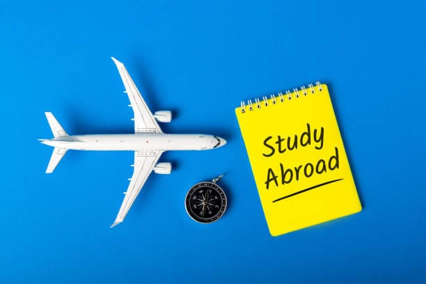 a toy plane is going to a page written study abroad