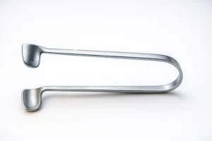 Hyper-realistic stainless steel nasal speculum featuring twin-blade design and curved spring handle, displayed diagonally on a clean white background with polished metallic reflections and surgical lighting.