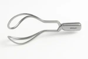 Hyper-realistic image of stainless steel Wrigley outlet forceps with curved blades and polished handle, displayed diagonally on a clean white background under soft surgical lighting.