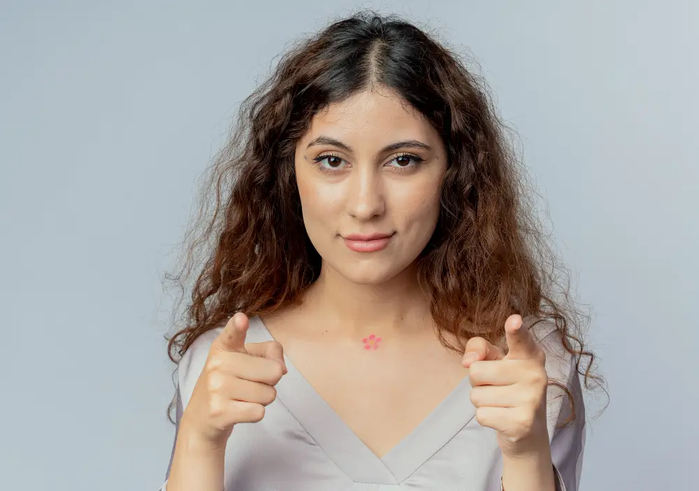 A young woman with a small skin tag on her neck, showing a common location where skin tags can appear due to friction or hormonal changes.
